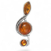 Pendentif exceptionnel en ambre cognac de Lituanie avec clé de sol en argent 925 AA | Bijoux Chakra
