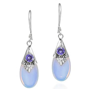 Boucles d'oreilles en Argent ornées de Pierre de Lune : Éveil de l'âme | Bijoux Chakra