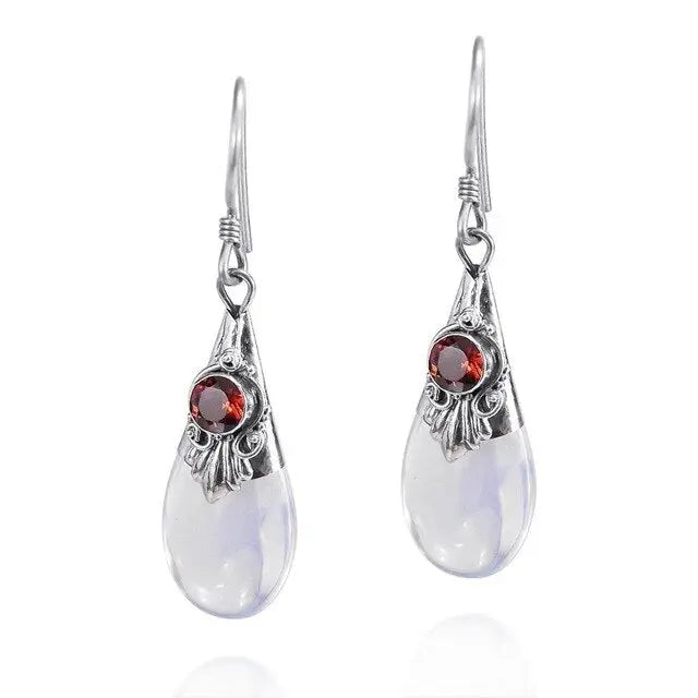 Boucles d'oreilles en Argent ornées de Pierre de Lune : Éveil de l'âme | Bijoux Chakra